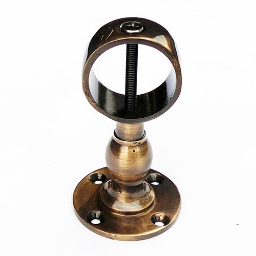 Antique brass center bracket with a cross screw for attaching a rope to a wooden post, showing the front view with four attaching screws and a visible rope loop.