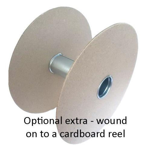 Cardboard reel with a metal core on a white background