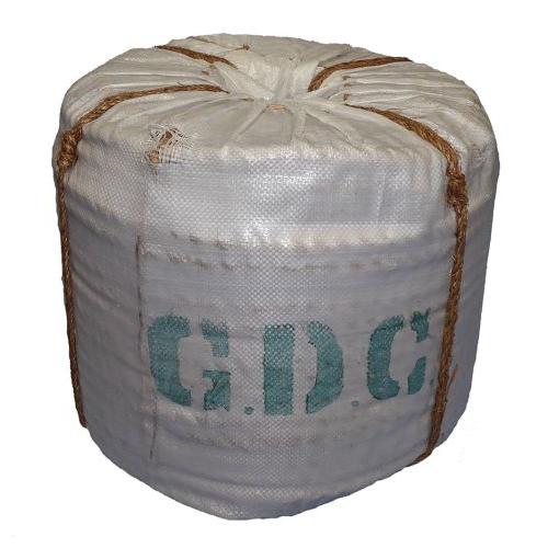 Coil of 20mm natural manila rope wrapped in white hessian and tied with brown cord.