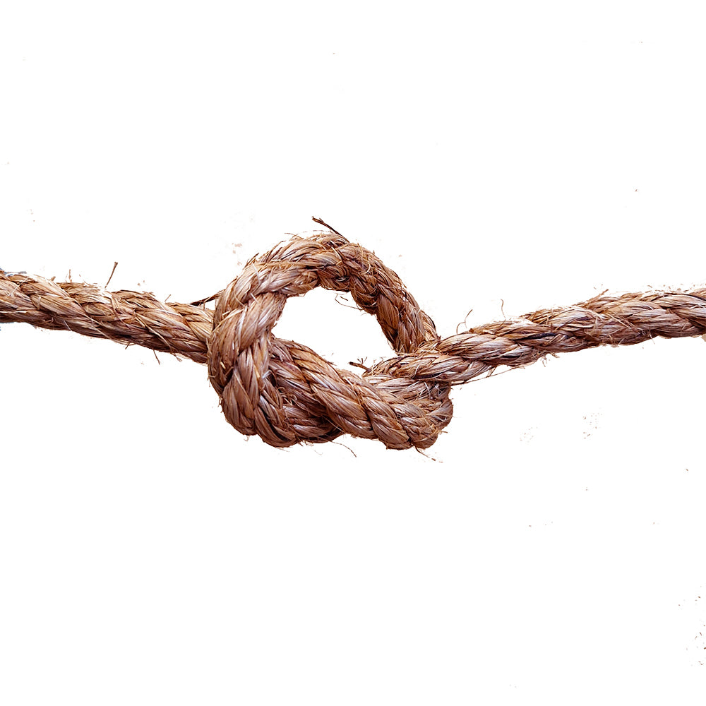 Close-up of a knotted rope on a white background