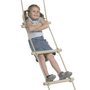 Young girl standing on a wooden rope ladder on a white background