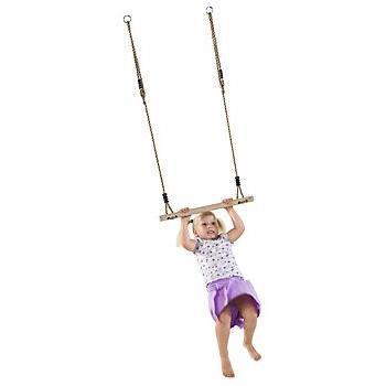Child on a trapeze swing against a white background