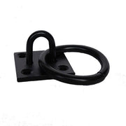 Black ring on a square steel plate with a white background