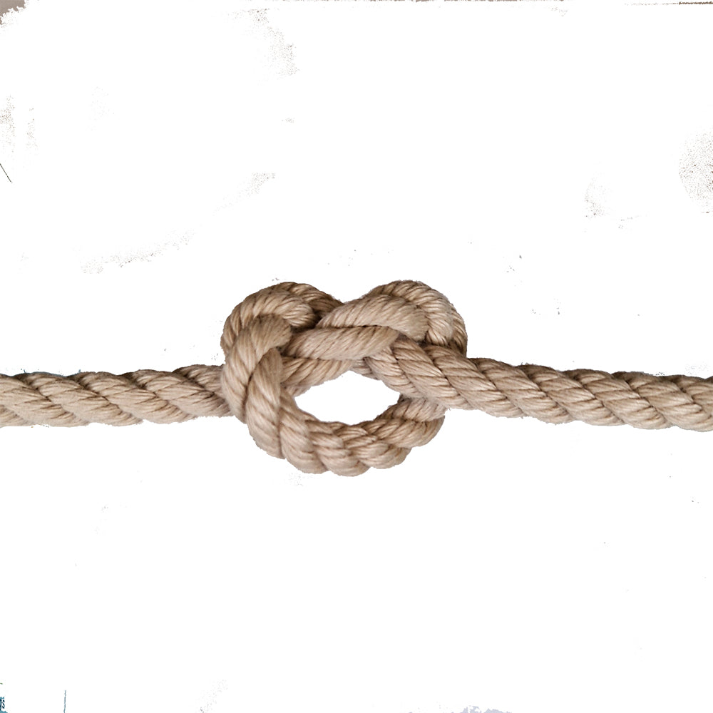 Natural rope with a knot on a white background