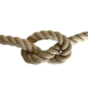 Close-up of a knotted piece of flax hemp rope on a white background