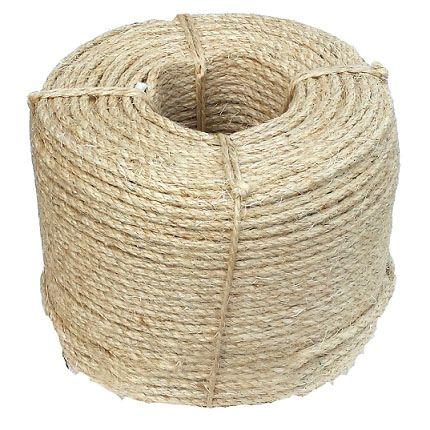 Coil of natural fiber sisal rope on a white background