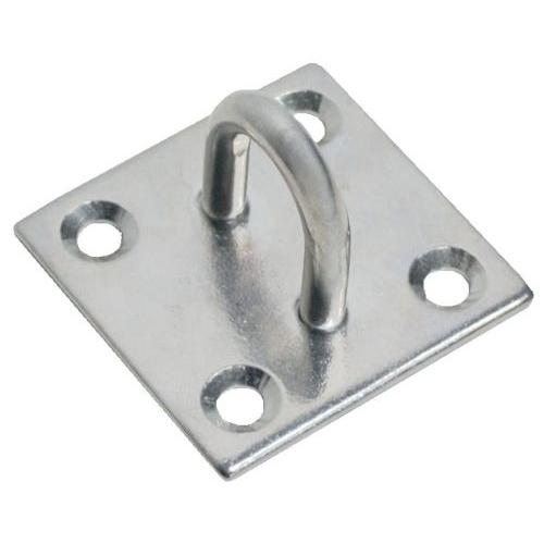 Stainless steel staple on a plate with four holes against a white background.