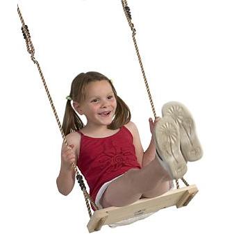 Child sitting on a wooden swing with a white background